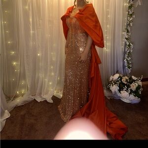 Selling these two couture dresses.